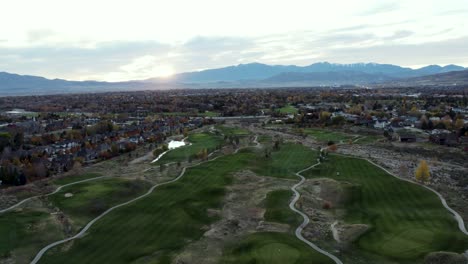 Golf-Course-Fairway-with-Beautiful-Utah-County-Sunset-in-Cedar-Hills,-Aerial