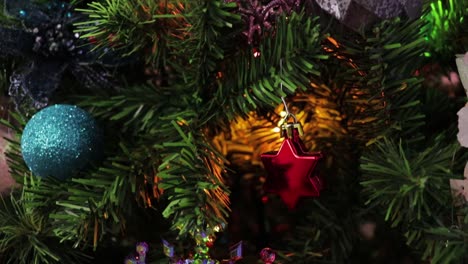 Christmas-tree-and-beautiful-ornaments.-Tilt.-Xmas-decorations