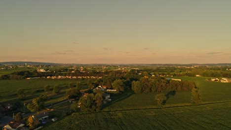 An-Aerial-View-of-Amish-Farms-and-Fields-During-the-Golden-Hour-on-a-Late-Summer-Afternoon