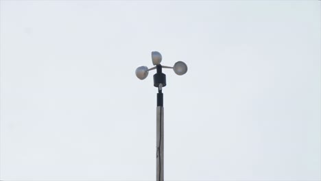 Air-measuring-device-anemometer-spinning-on-the-wind