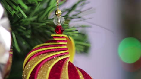Glitter-foami-christmas-ornament,-hanging-from-the-christmas-tree
