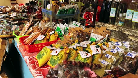 -Selections-of-spices,-souvenirs-in-town-market-of-Victoria-Mahe-Seychelles,-located-inside-the-Sir-Selwyn-Clarks-market,-that-was-build-by-the-British-in1840,-a-sections-of-other-products-are-selling