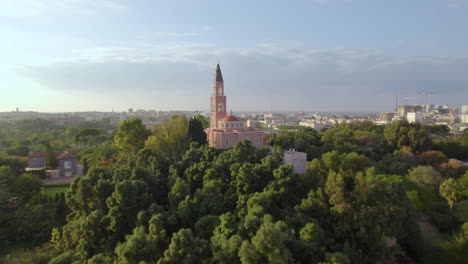 beautiful-Orthodox-church-surrounded-by-trees-and-lawns---push-in-drone-shot