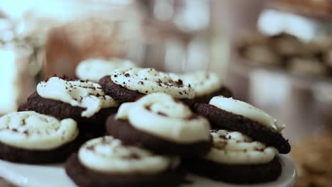 Delicious-Chocolate-Cookies-With-Vanilla-Icing-At-The-Wedding-Reception