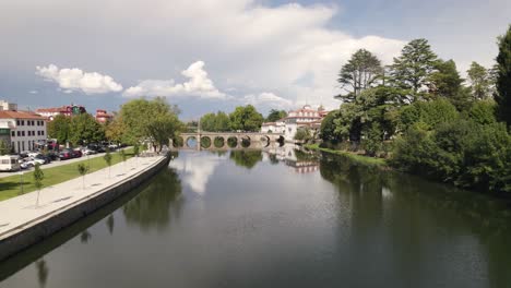 Aerial-slowly-rotating-over-Tamega-river-panorama-at-Chaves-Downtown---Portugal