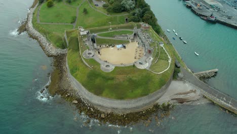 Nothe-Fort-In-Weymouth,-England---aerial-drone-shot