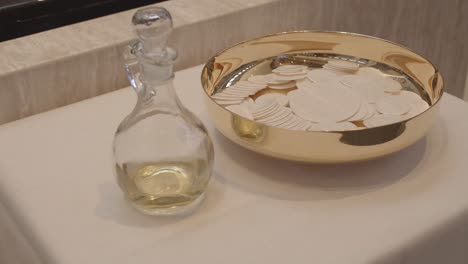 Consecrated-communion-hosts-on-a-golden-bowl,-Christian-Catholic-Celebration