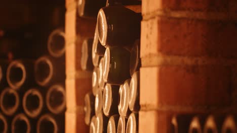 Cinematic-tilt-up-shot-of-wine-collection-in-old-cellar-on-wine-farm