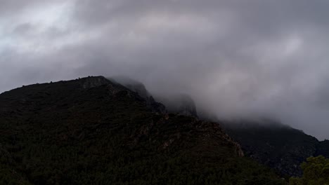 Time-lapse-of-clouds-passing-through-mountains-in-Spain