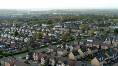 Typical-northern-English-town-suburban-housing-estate-aerial-view-descending-slow-shot