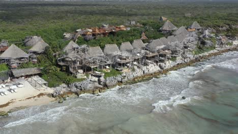 Azulik-seafront-resort-with-wooden-accommodation,-Tulum-in-Mexico