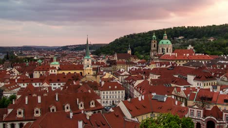 Day-to-night-sunset-timelapse-from-Prague,-Czech-Republic-with-a-view-of-the-red-roofs-of-Mala-Strana,-St