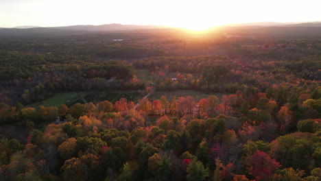 Autumn-Sunset,-Aerial-View-of-Colorful-Landscape,-Vivid-Foliage-Colors-and-Sun