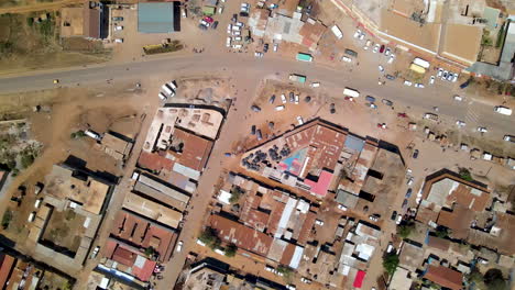 Top-down-aerial-of-streets-running-through-slum-neighborhood-in-a-rural-Kenyan-town