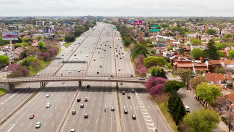 Thousands-of-vehicles-crossing-the-multi-lane-Pan-American-Highway-in-drone-view-from-above