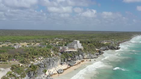 Aerial-drone-view-of-Mayan-seafront-ruins,-Tulum
