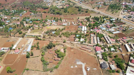 jib-down-of-a-small-town-with-green-trees-in-beautiful-Kenya