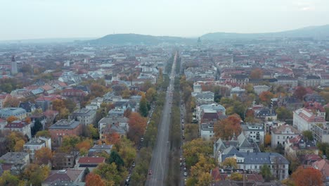 Air-view-of-straight-Andrássy-Ut-Avenue-Boulevard-in-Budapest-city,-drone-shot