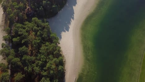 Aerial-drone-view-of-the-tropical-paradise-looked-in-the-Henschotermeer-in-the-Netherlands,-Europe