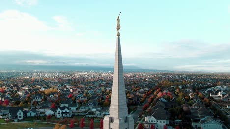 BEAUTIFUL-AERIAL-WITH-ANGEL-MORONI-RAISING-TO-THE-SKY-IN-THE-LDS-MORMON-OQUIRRH-MOUNTAIN-TEMPLE-AT-SOUTH-JORDAN-UTAH