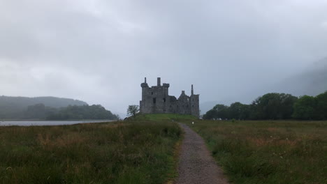 Cloudy-Sky-Over-Kilchurn-Castle-Next-To-Loch-Awe-In-Argyll-And-Bute,-Scotland-On-A-Rainy-Day