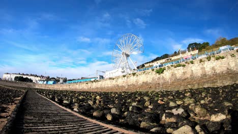 Clouds-passing-above-Llandudno-pier-Ferris-wheel-attraction-dismantling-at-end-of-tourism-season-2021-time-lapse