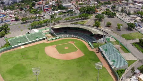 Drone-flying-over-empty-Tetelo-Vargas-stadium,-San-Pedro-de-Macoris-in-Dominican-Republic