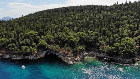 Cypress-And-Olive-Tree-Forest-On-Rocky-Outcrop-At-Foki-Beach-In-Ionian-Island,-Kefalonia,-Greece