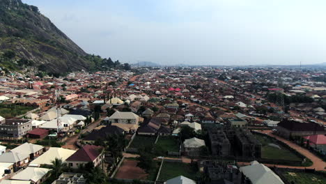 Sweeping-panoramic-aerial-view-of-the-Dutse-Alhaji-suburb-of-Abuja,-Nigeria-in-West-Africa