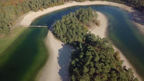 Aerial-drone-view-of-the-beautiful-recreational-lake-of-the-Henschotermeer-in-the-Netherlands,-Europe