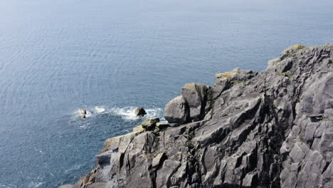 Magnificent-Rocky-Cliffs-on-the-Dingle-Peninsula-Coast-in-Ireland,-Aerial