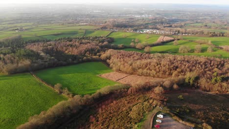 Aerial-Over-Car-Park-Next-To-Woodbury-Common,-Devon-England