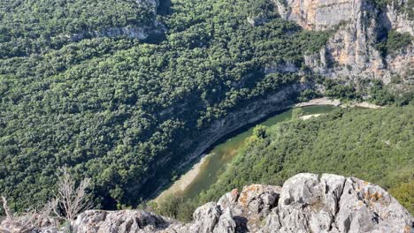 Aerial-view-of-Gorges-de,-Ardèche-kayak-canoe,-the-beautiful-valley-side-of-green-and-rocks