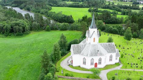 Charming-Old-Eikesdal-Church-In-Møre-og-Romsdal-County-Norway---aerial-shot