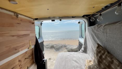 Static-view-from-inside-a-furnished-van-of-a-magnificent-sea-panorama