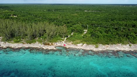 Aerial-View-of-a-Caribbean-Ironshore-and-Jungle-in-the-Background