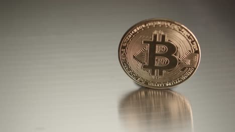 Bitcoin-coin-emblem-with-symbol-or-logo,-focusing-slider-view-closeup