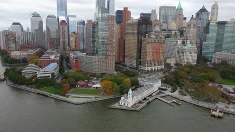 Aerial-view-around-the-pier-a,-in-front-of-the-lower-Manhattan-skyline,-in-New-York---orbit,-drone-shot