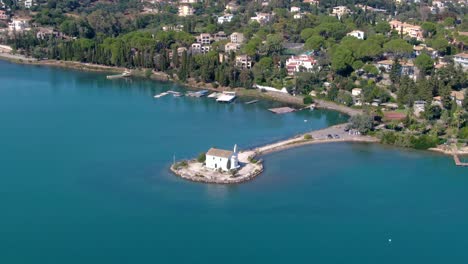 Aerial-view-of-Beautiful-Church-of-the-Hypapante-at-Gouvia-beach-in-corfu-Greece