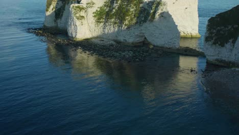 4K-Panoramic-landscape-panning-shot-of-the-cliffs-of-Old-Harry-Rocks-on-a-sunny-day