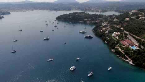 Drone-view-of-corfu-island-with-boats-at-komeno-bay
