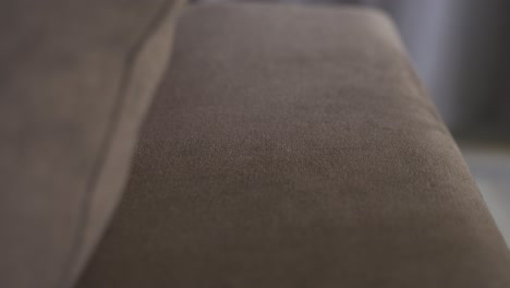 Close-up-of-sofa-armrest-plush-texture-in-4K