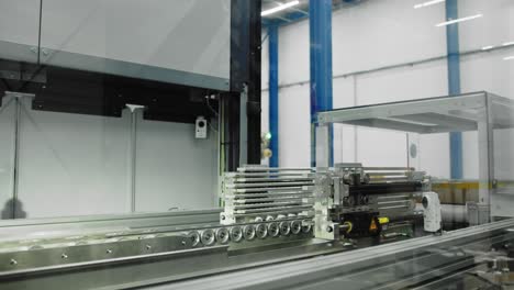 Goods-being-boxed-by-automated-machinery;-innovative-engineering