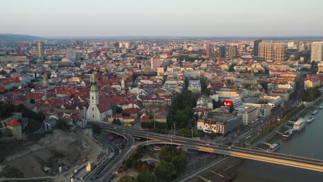 Wide-revealing-drone-shot-of-Bratislava-Slovakia-with-the-Saint-Martin's-Cathedral-in-the-foreground