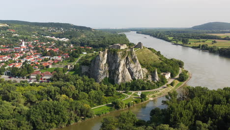 Rotating-wide-cinematic-drone-shot-of-Hrad-Devin-castle