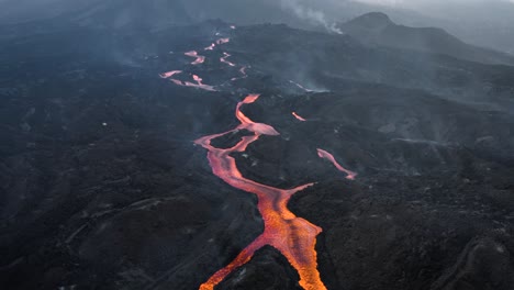 drone-flying-backwards-and-revealing-Cumbre-Vieja's-lava-streams