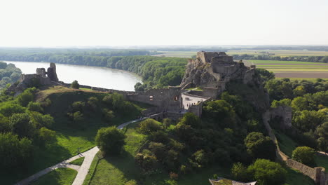 Rotating-wide-cinematic-drone-footage-of-the-Hrad-Devin-castle-in-Bratislava,-Slovakia