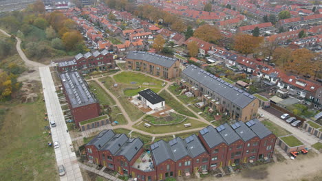 Aerial-of-small,-new-neighborhood-with-solar-panels-on-rooftop
