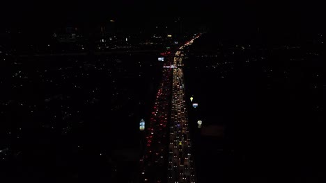 aerial-shot-traffic-highway-night-view-of-a-city