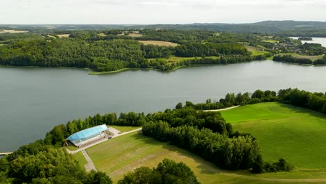 Aerial-View-Of-Brodno-Wielkie-Lake-In-Poland-On-A-Cloudy-Day---drone-shot